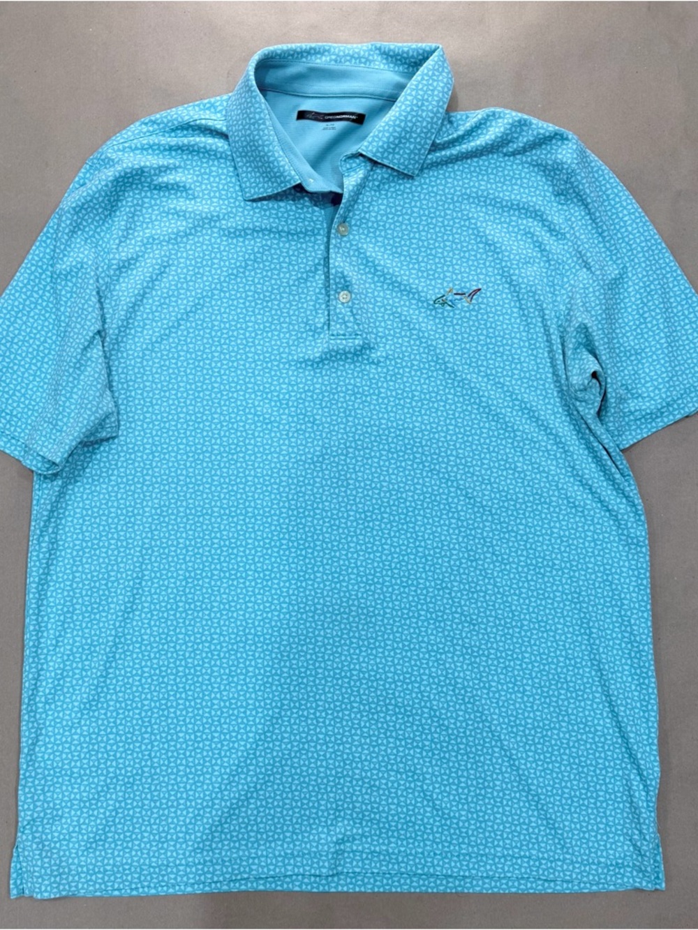 Greg Norman Shark Logo Polo – Men’s XLTG Light Blue Performance Golf Shirt